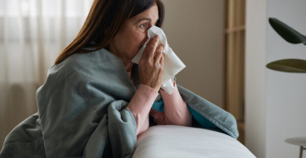 DERMATOLOGY PATIENT BLOWING NOSE