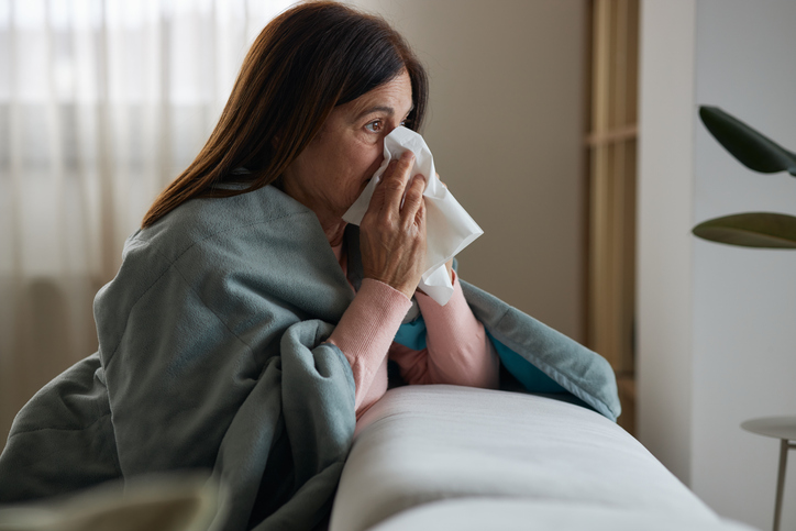 DERMATOLOGY PATIENT BLOWING NOSE